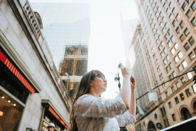 Tourist taking photo in NYC