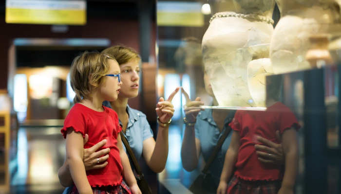 mother and daughter tour an exhibit at the New York Historical Society