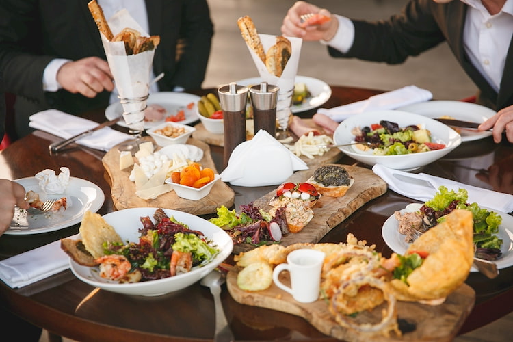 Group lunch table with assorted food