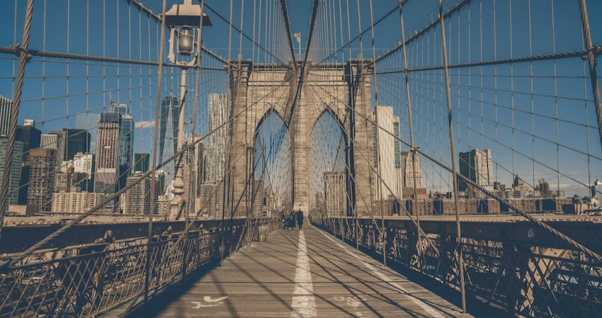 view of the Brooklyn Bridge in New York City from its pedestrian walkway