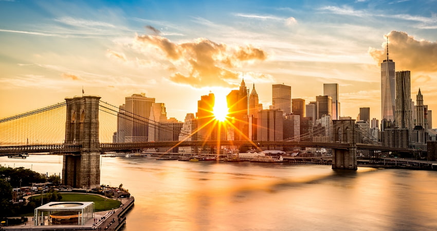 aerial view of the Brooklyn Bridge and Manhattan skyline in New York City