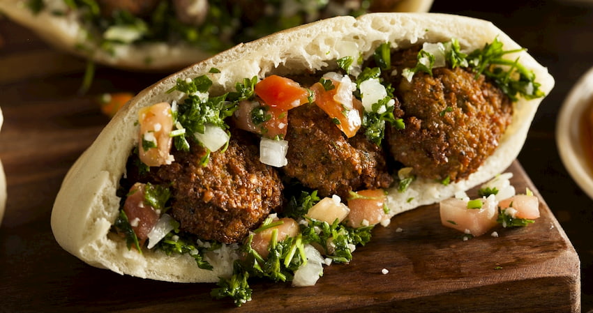 a falafel on a pita from Maumoun's Falafel