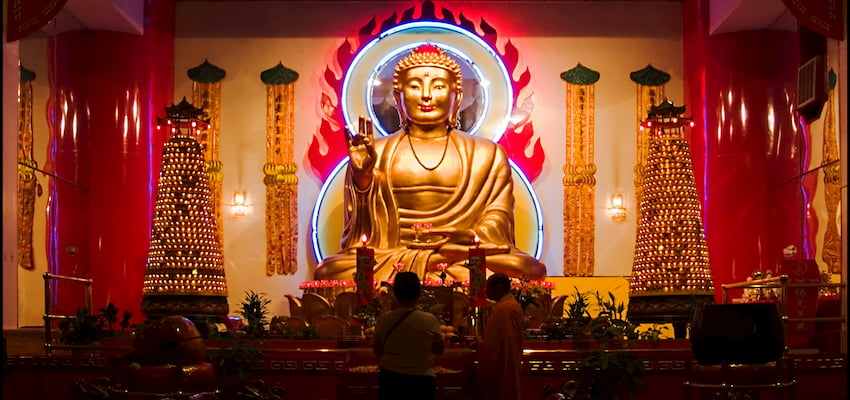 the 16-foot Buddha at the Mahayana Temple in New York City