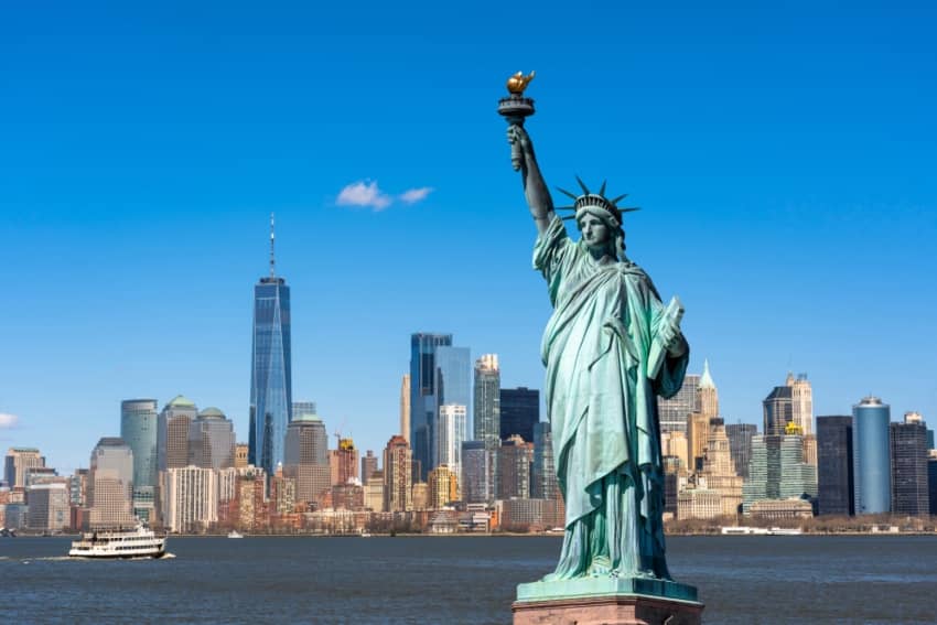 The Statue of Liberty with New York City in the background