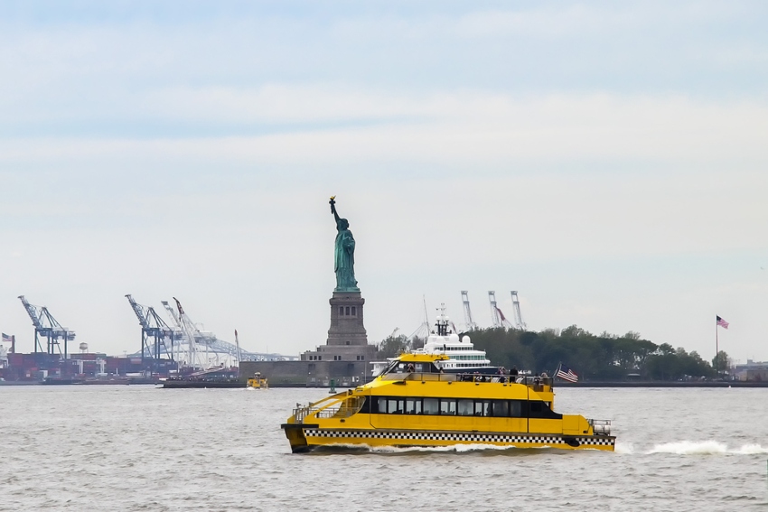 A ferry sails to Liberty Island