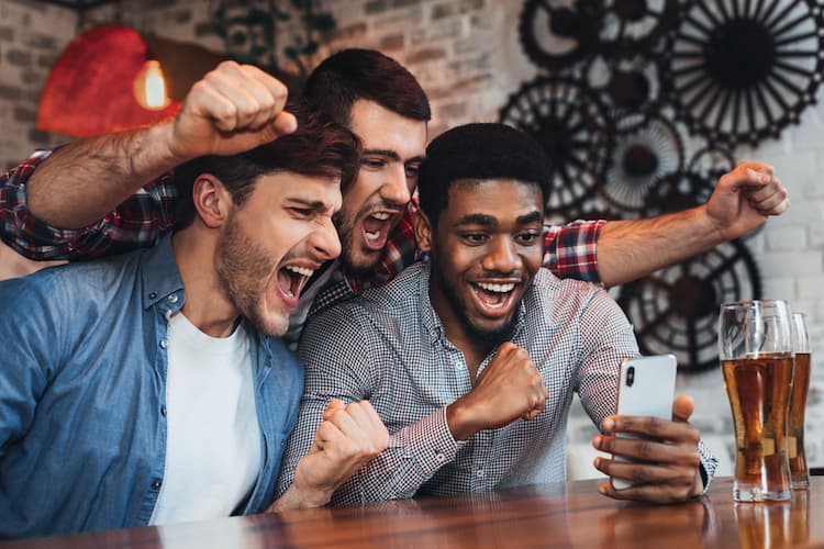 Fans watching game on smartphone