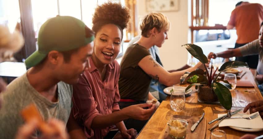 A group of friends dining at a restaurant