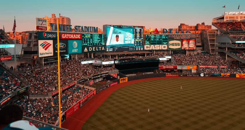 View from the stands of Yankee Stadium during a game, full of spectators