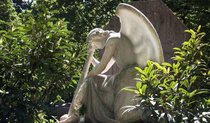 An angel statue at a cemetery