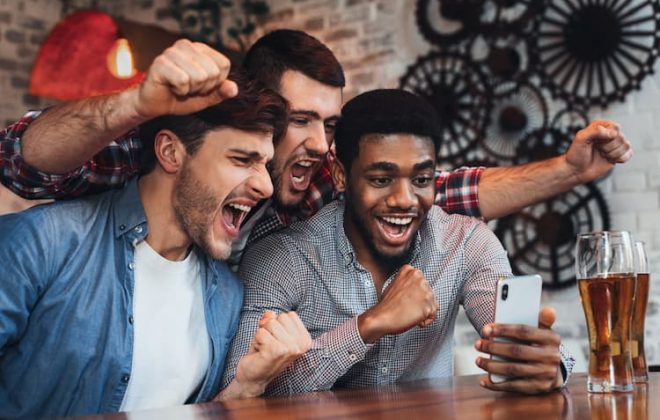 Fans watching game on smartphone