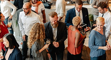 Event attendees gather and wait for their New York City charter bus